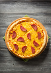 pepperoni pizza at wood