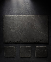 slate signboard at black