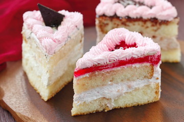 Delicious cake with cream and jelly