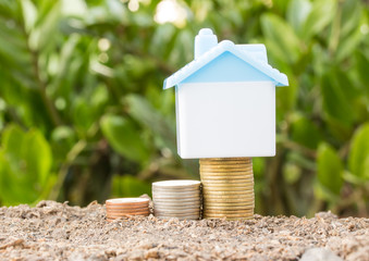 Saving to buy a house that stack  coin growing ,saving money or money growth concept
