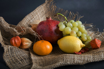Mixed fruit composition on canvas background