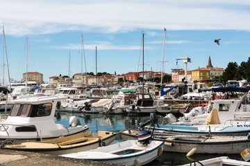 A number of yachts and sailing boats in croatian harbor.