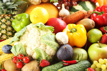 Ripe and tasty fruits and vegetables background