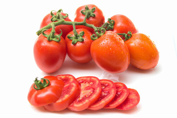 Close up red cherry tomato on white background isolated.