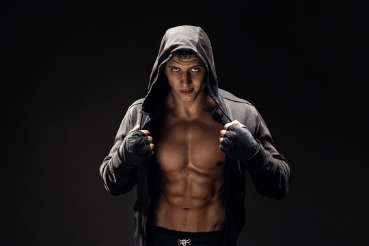 Strong Athletic Man Fitness Model Torso showing six pack abs. - Powered by Adobe