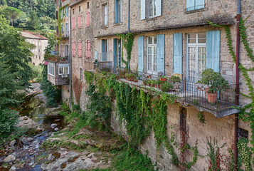 Fototapeta na wymiar River along the old town Largentiere