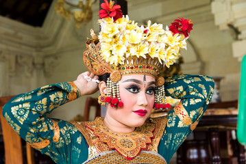 balinese legong dancer prepare for her stage