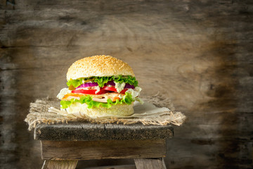 The traditional hamburger Patty cheese fresh tomato, lettuce, beef Burger, takeaway