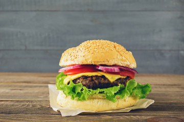 The traditional hamburger Patty cheese fresh tomato, lettuce, beef Burger, takeaway