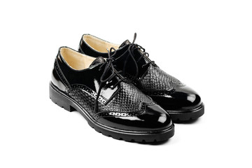 Spring or autumn black shoes isolated on white background