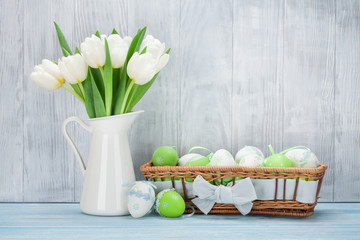 Easter eggs and tulips bouquet