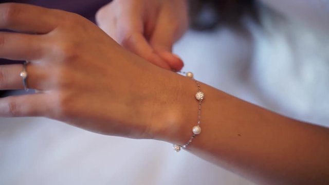 Bride with jewelry bracelet on hand