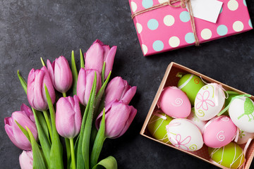 Pink tulip flowers and easter eggs