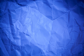 Blue crumpled paper texture background.