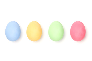four colorful easter eggs isolated on white background without pattern on eggs shell