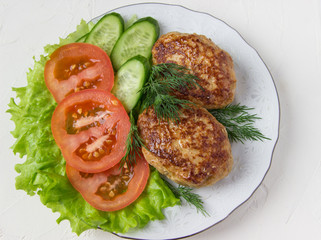 Fried cutlets  and vegetable.