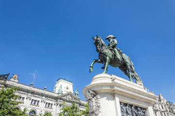 Liberdade square with monument of King Pedro IV statue in foreground and city hall in the top of Aliados Avenue, at Porto city, one of the most popular tourist destinations in Europe.