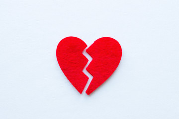 Fototapeta premium broken heart close up on a white background