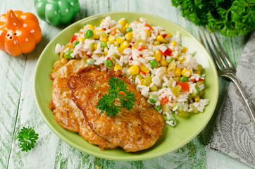Chicken chops with rice and vegetables