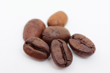 Close up coffee beans on white background.Selective focus.