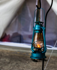 A hanging oil lamp on the beach camping,hurricane lantern