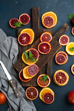 Citrus fruit background with sliced oranges