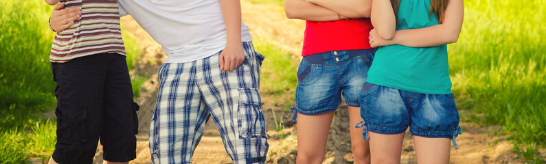 Four teenage friends having fun in the nature