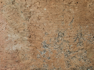 Closeup brown rough clay wall
