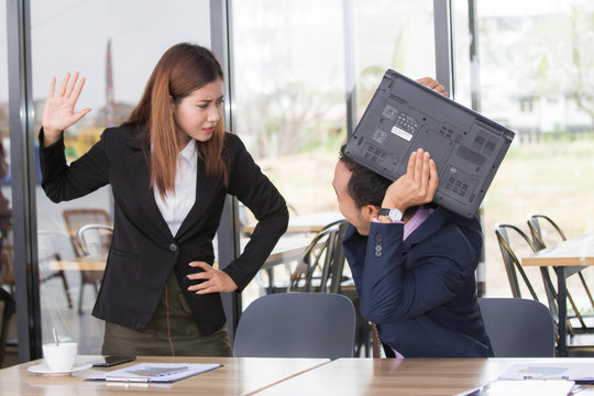 Asia business people or businessman and businesswoman working, Woman angry businessman when working together.