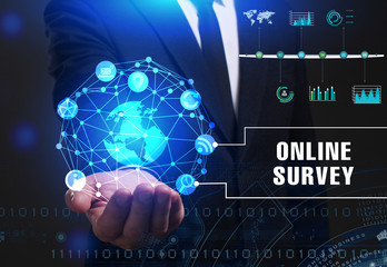 Business, Technology, Internet and network concept. Young businessman working on a virtual screen of the future and sees the inscription: Online survey