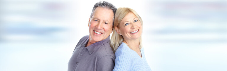 Senior couple smiling.