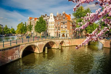 Tuinposter Bridges over canals in Amsterdam at spring © sborisov