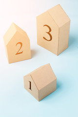 Obraz premium three house model cardboard with free copyspace house loan business concept