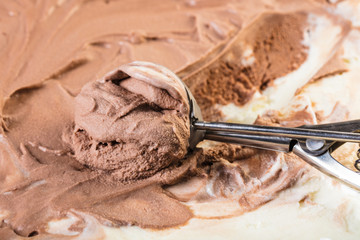 Spoon with ice cream closeup