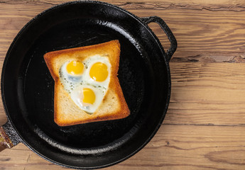 fried quail eggs in a toast