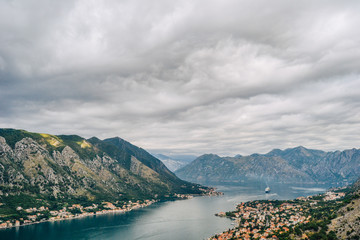 Panoramic view of port, town and mountains in Kotor, Montenegro