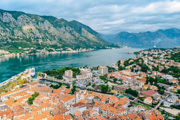 Fototapeta na wymiar Panoramic view of port, town and mountains in Kotor, Montenegro