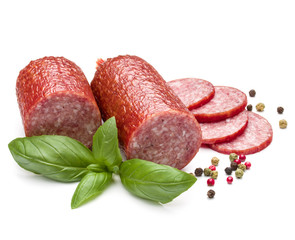 Salami smoked sausage, basil leaves and peppercorns isolated on white background cutout