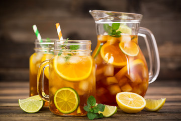 Ice tea with lemon, lime and mint