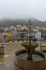Fototapeta na wymiar View on old city during a foggy and rainy day, Sintra, Portugal 