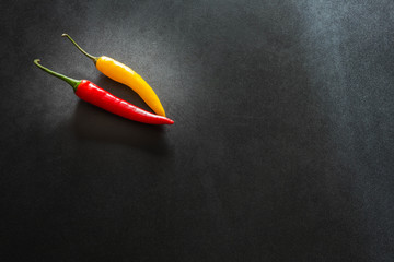Hot pepper on a dark stone table
