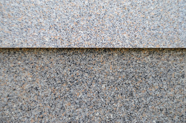 Polished Gray granite wall texture with horisontal seam