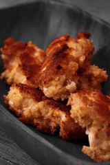 Chicken Goujons breaded and deep fried in a wooden bowl with selective colour