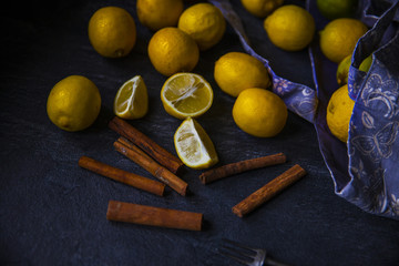 Ripe lemons in bag with knife