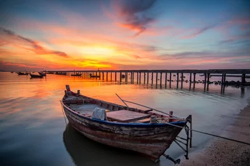 Gordijnen Beautiful sunset landscape sunset on the sea beach with a boat at Bangpra beach chonburi,thailand © martinhosmat083