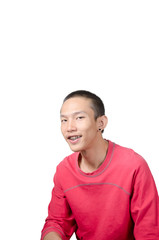 Portrait of a young Asian man wearing red t-shirt isolated on white