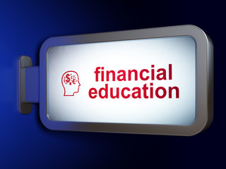 Learning concept: Financial Education and Head With Finance Symbol on billboard background