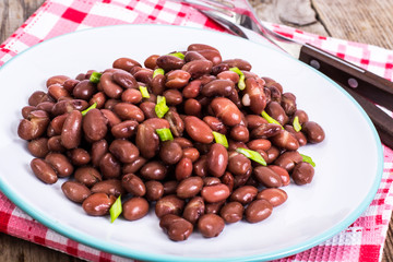 Spicy dish of red beans with green onions and spices