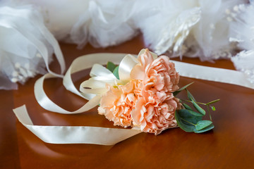 Wedding boutonniere pink. Pink rose boutonniere for groom, wedding decor