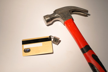 Credit card with hanging padlock and hummer